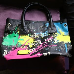 L.A.M.B Paint splatter purse